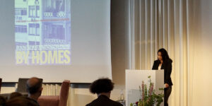 Symposium Haunted by Homes